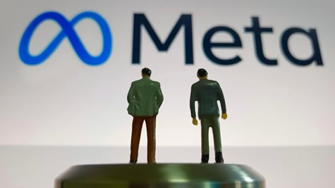 meta written in black, blue eternity symbol logo, two human figurines in suits
