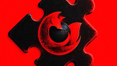 A black puzzle piece with a Firefox logo on it