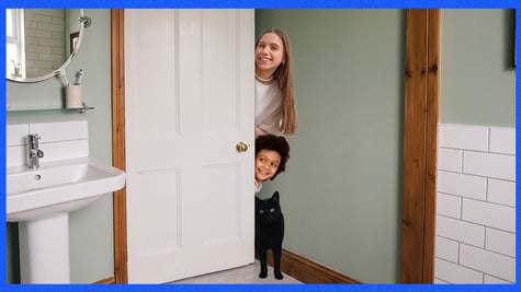 cat and kids trying to get into through closed bathroom doors