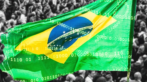 Brazilian flag with people in the background