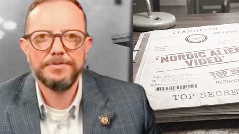 Congressman Eric Burlison next to UFO disclosure files.
