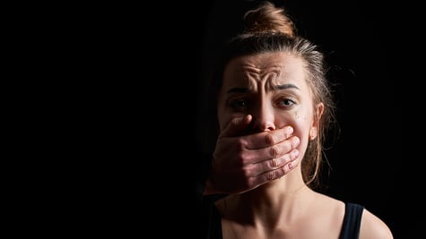 Portrait of stressed unhappy crying woman victim in fear
