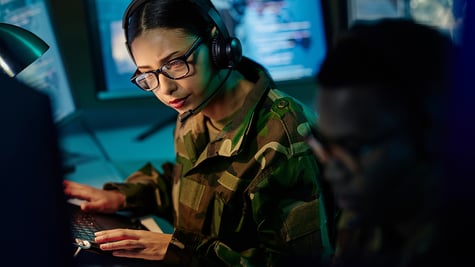 Military control room team, headset and woman with computer and tech for communication
