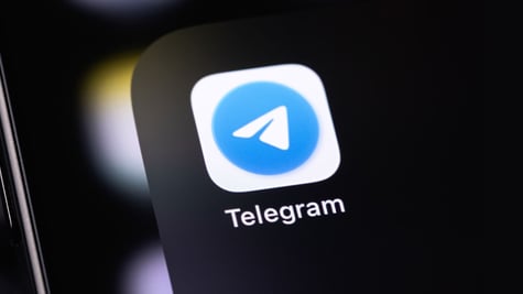 telegram logo on a device screen