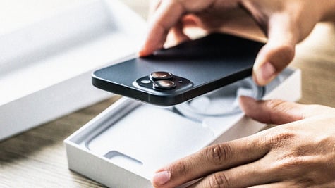 used iphone is being put in a box