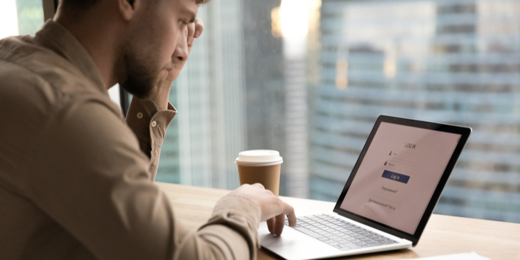Young man preparing to input personal details on website login page