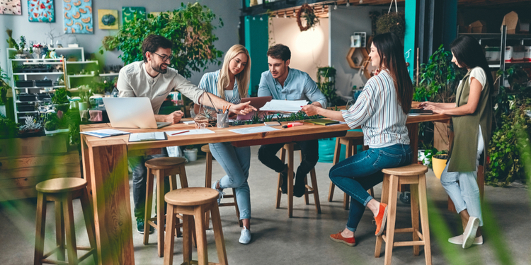 Group of young business people are working together in modern office