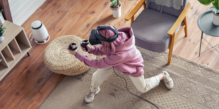 woman playing with VR glasses