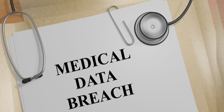 Medical data breach written on document with doctor's tools