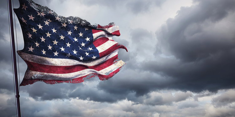 Symbolic depiction of ragged US flag to show country taking a pounding from cyber attacks