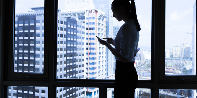 Female executive on phone in office