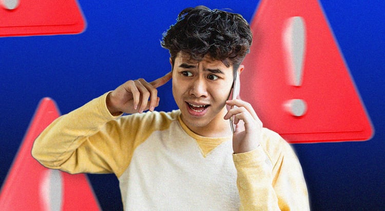 young black man block his ear, talks over the phone, alarm signs