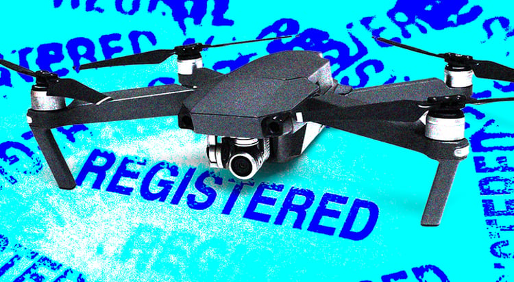 black frone on light electric blue sign REGISTERED