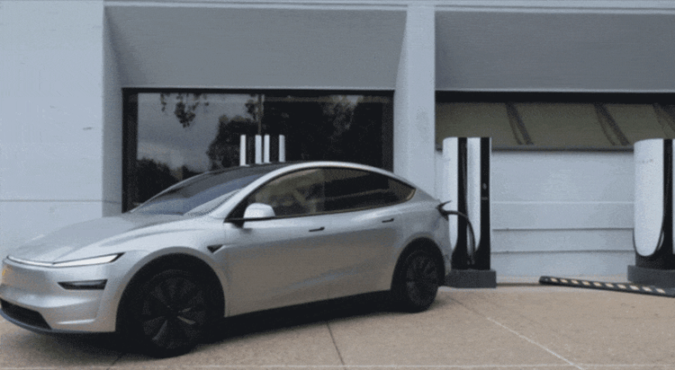 Tesla in a charging station