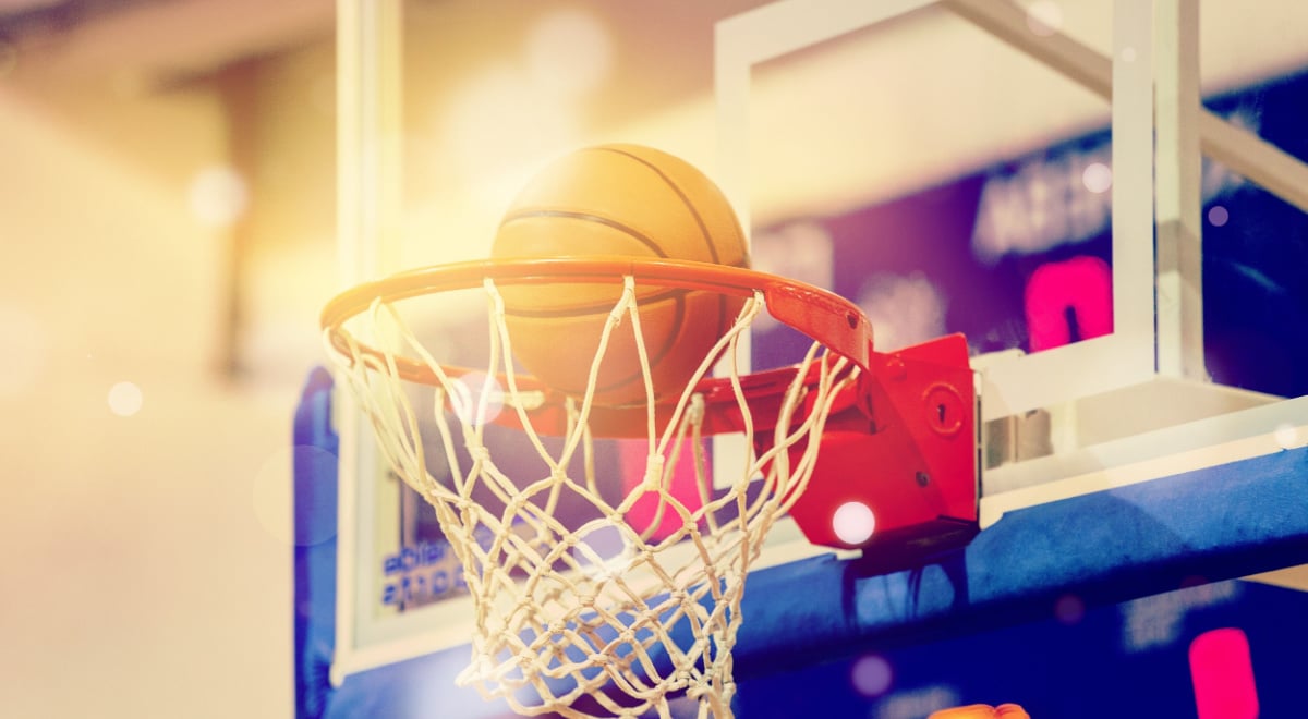 Orange basketball in the hoop