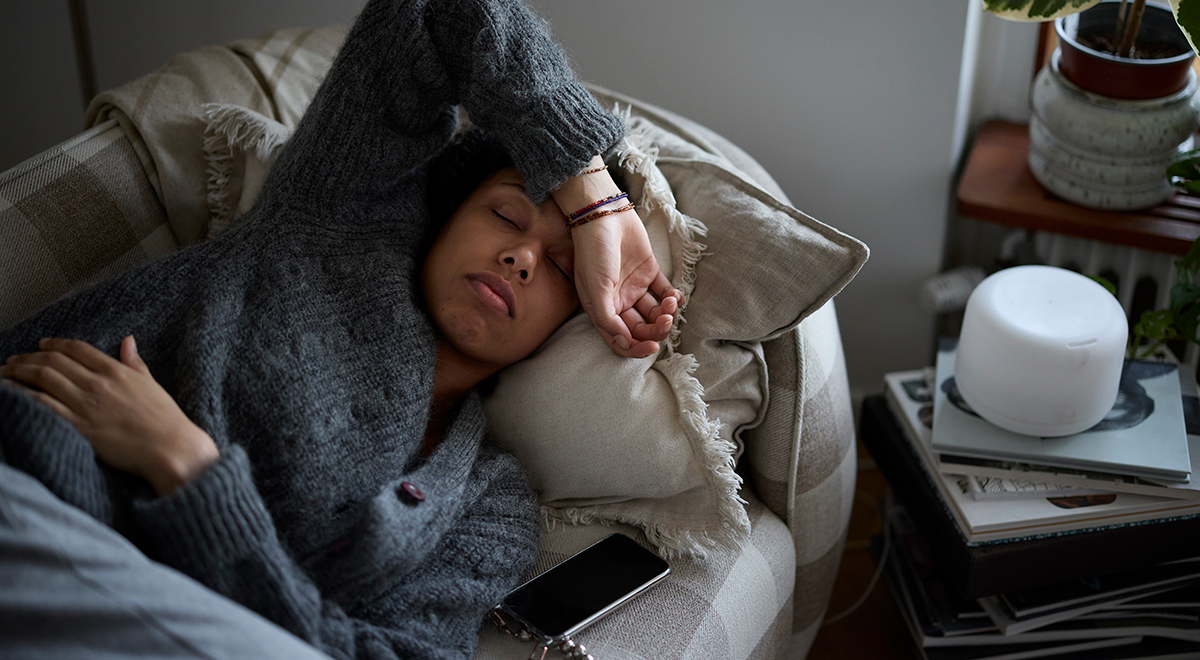 hypochondriac woman lying on sofa