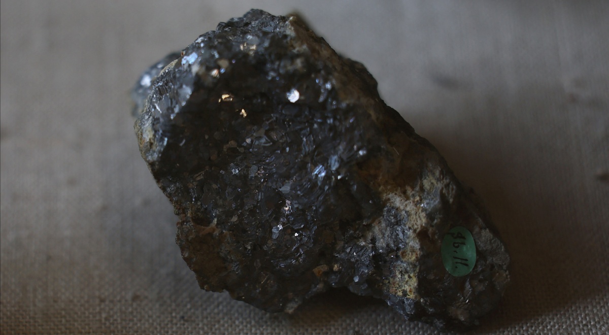 black sparkly rock on a brown material