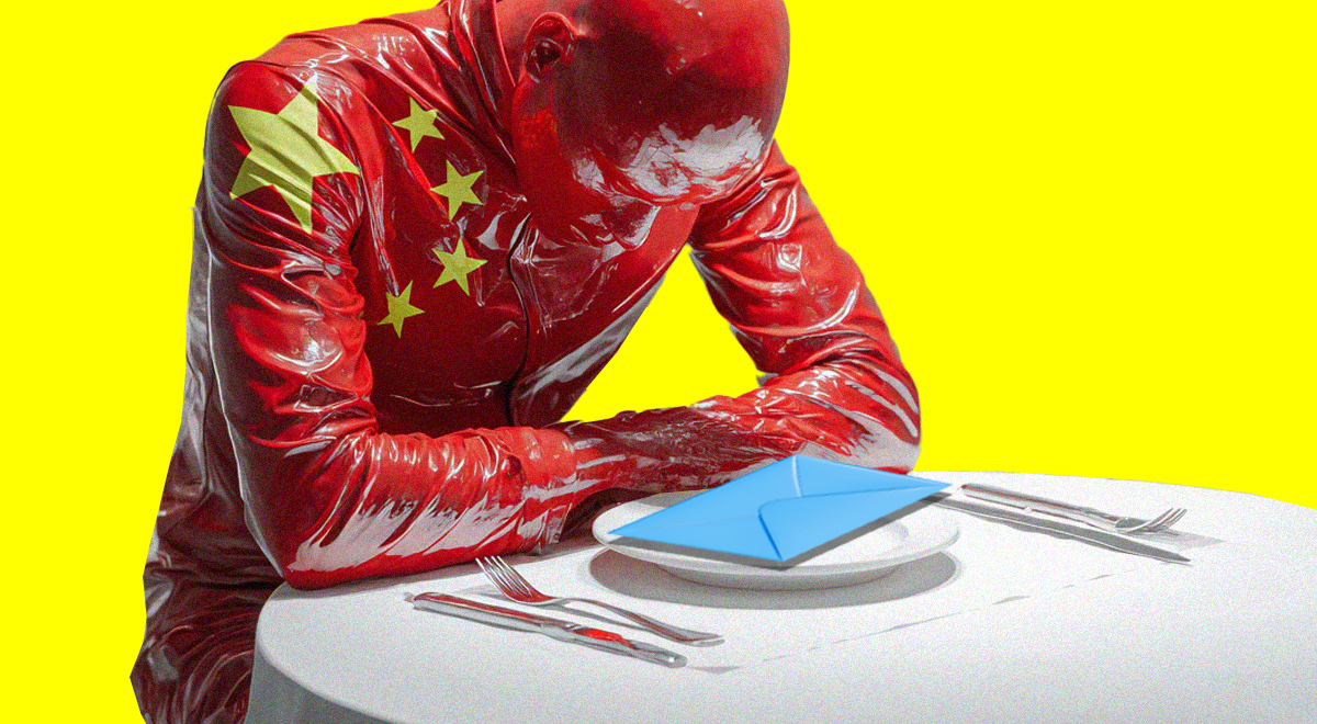 china flag man sitting on the table looking at a mail letter