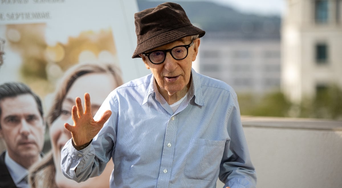 American director Woody Allen waving at camera