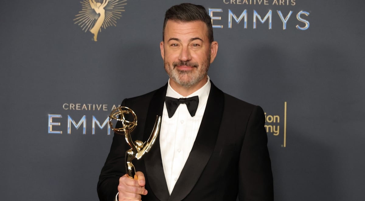 Comedian Jimmy Kimmel holding an Emmy award