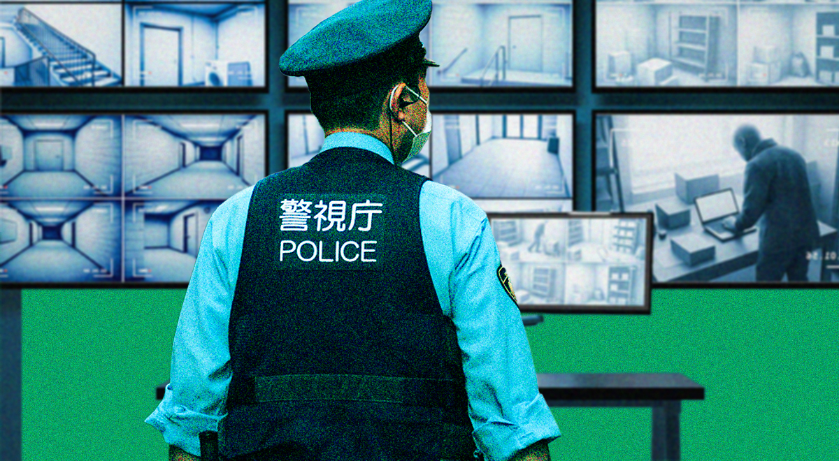 A Tokyo cop watching AI surveillance screens.