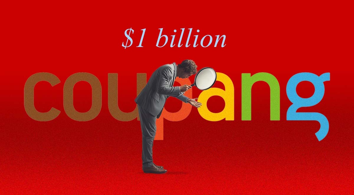 Suited man looking through magnifying glass at his hand, red background, coupang logo