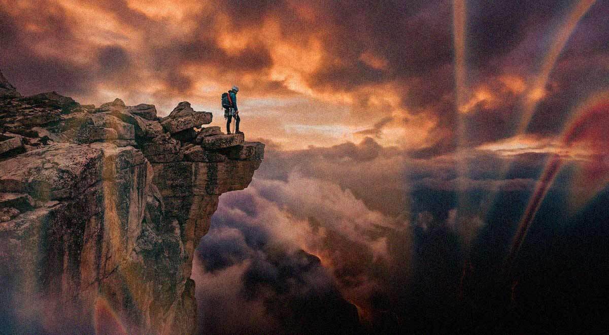 A lone climber at the end of the abyss.
