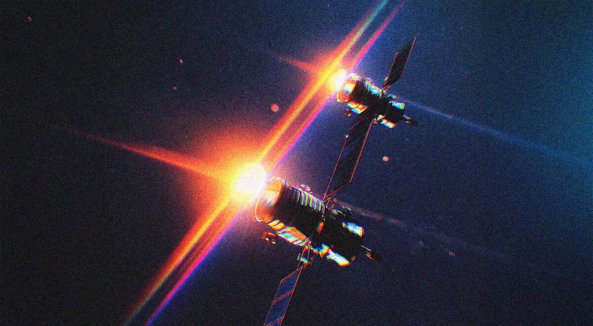 Two space satellites, passing each other, like ships in the night.