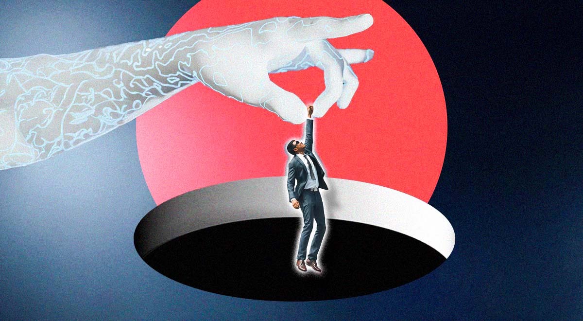 A robot's hand holding a person dressed as an office worker who is about to fall