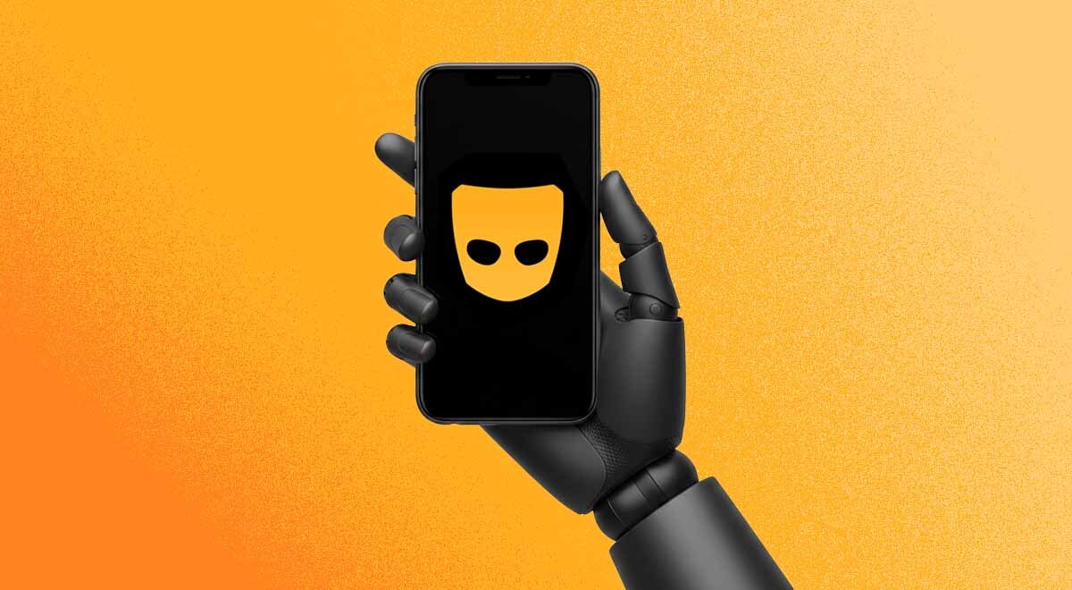 A robot's hand holding a smarphone with Grind's logo on the screen
