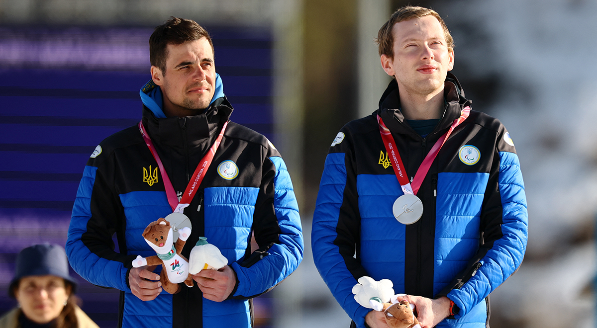 Silver medallist Maksym Murashkovskyi of Ukraine and guide Vitaliy Trush