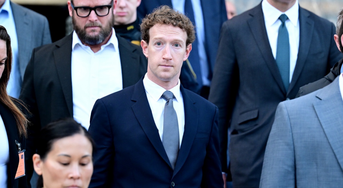 Mark Zuckerberg, pale skin, blue tie, white collar shirt, pale skin, curly light brown hair