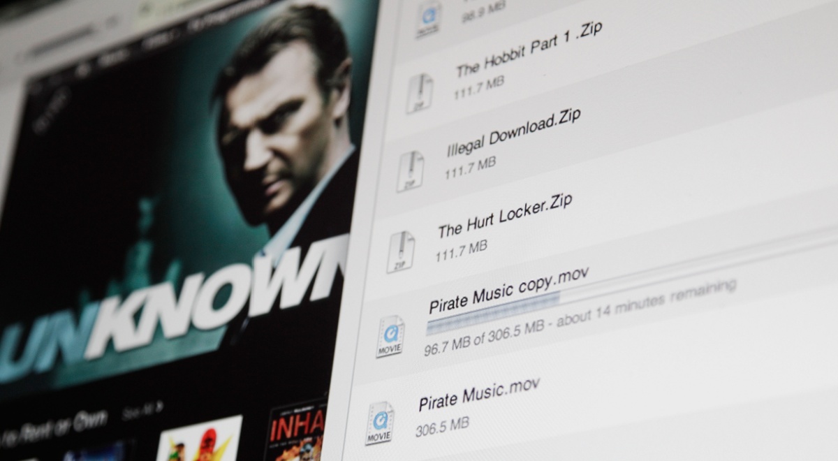 james-bond-ish movie poster on left, shadowy man's face, black suit, white download page with files