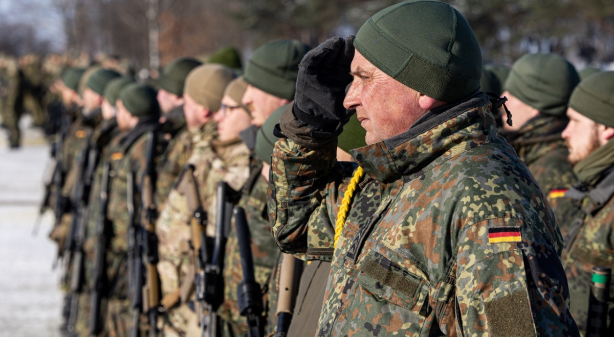 german army, winter, in line, germany flag, green uniform, red cheeks,
