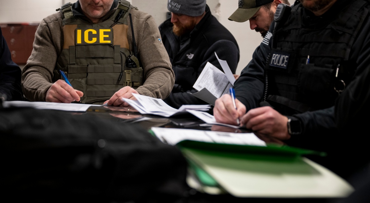 ICE agents during raid