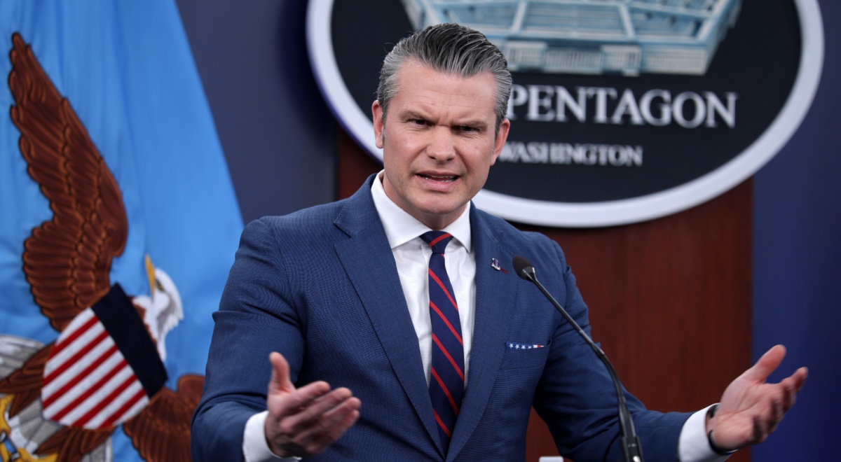 Pete Hegseth, animated, speaking at the Pentagon.