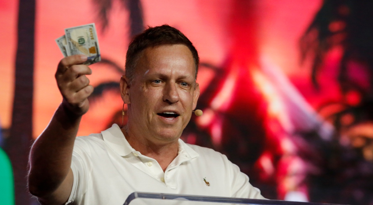 peter thiel, man, brown hair, white polo shirt, holds dollars, red sunset, palm tree