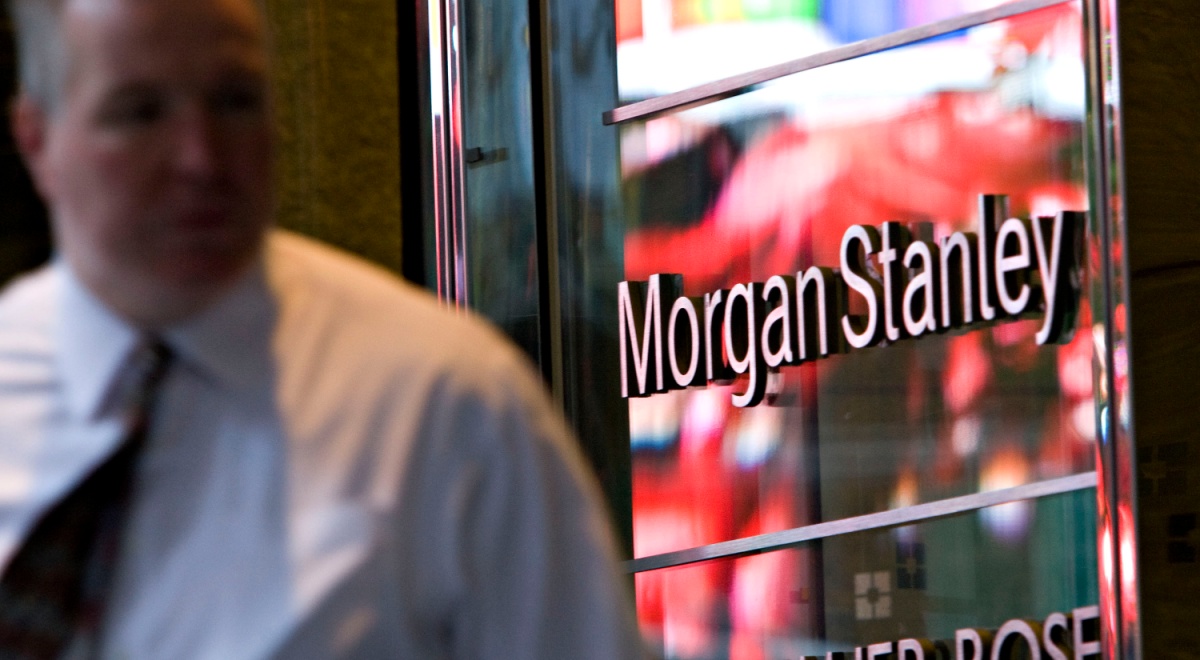 morgan stanley sign in red glass, fat man in white shirt, black tie, bald head 