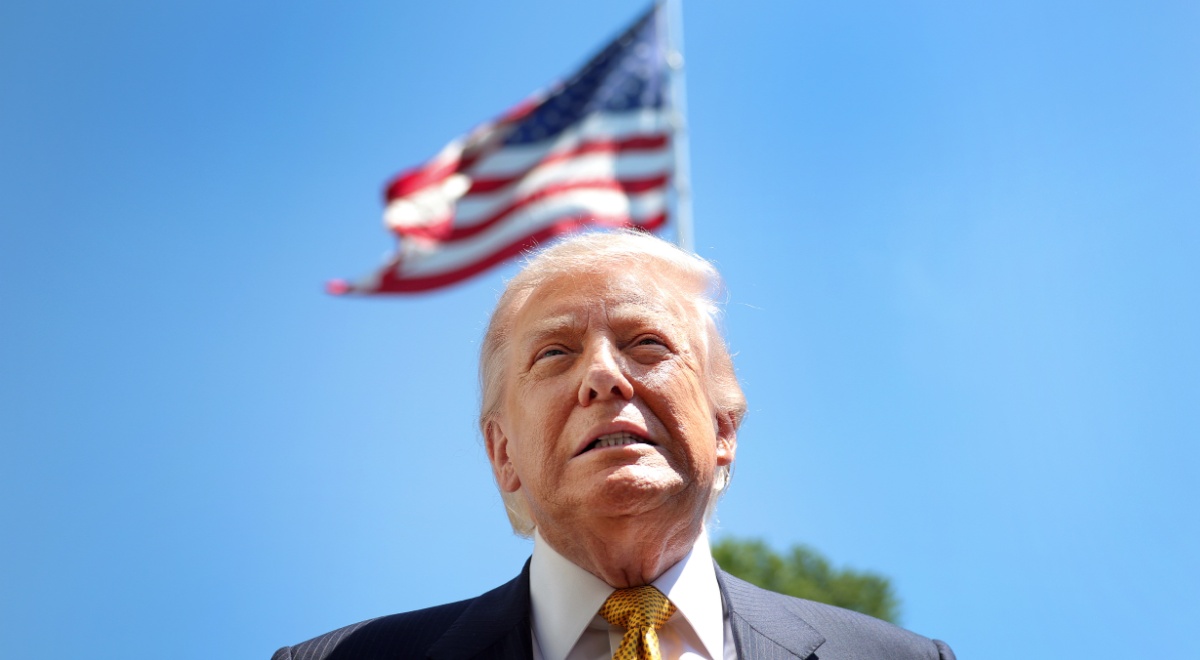 US President Donald Trump, blonde hair, usa flag in wind, blue clear sky, white collar shirt