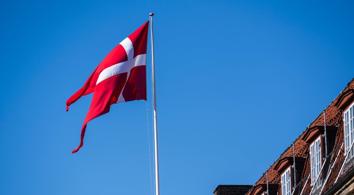 Danish flag during King's Clock ceremony at the Life Guards Barracks in Copenhagen