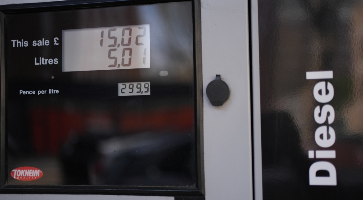 grey and black fuel monitoring screen, 299.9p, diesel sign 