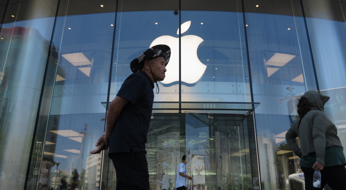 apple store, glass wall, apple logo, old asian man, hands behind back, cowboy hat camouflage print, 