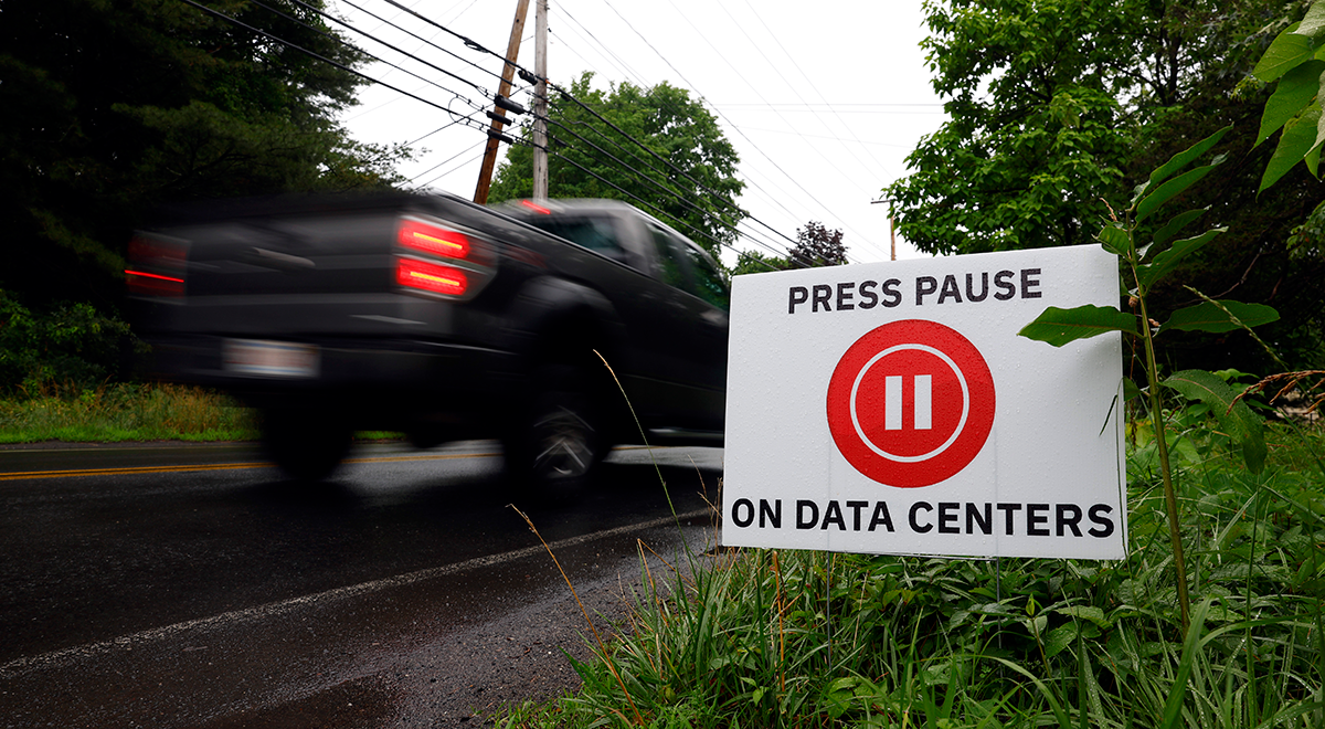 Signs against data centers line Lockhouse Road,