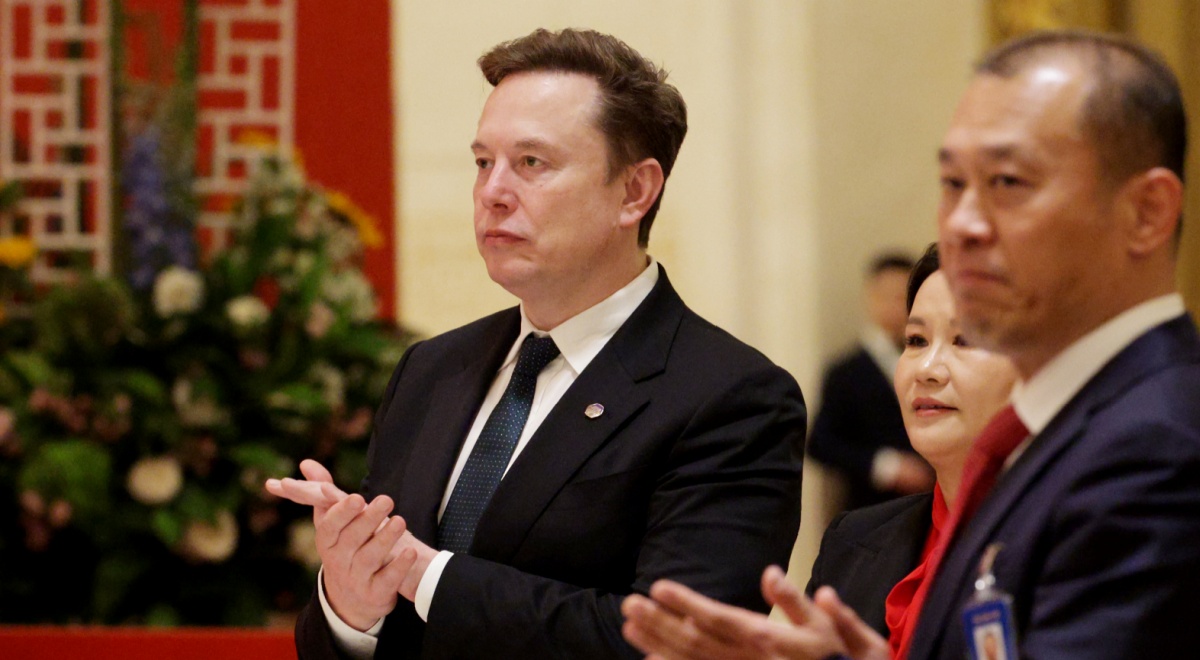 elon musk, white male, black suit, white collar shirt, asian man and woman, red shirt