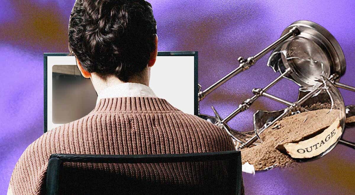 A stressed office worker stares at a frozen ChatGPT