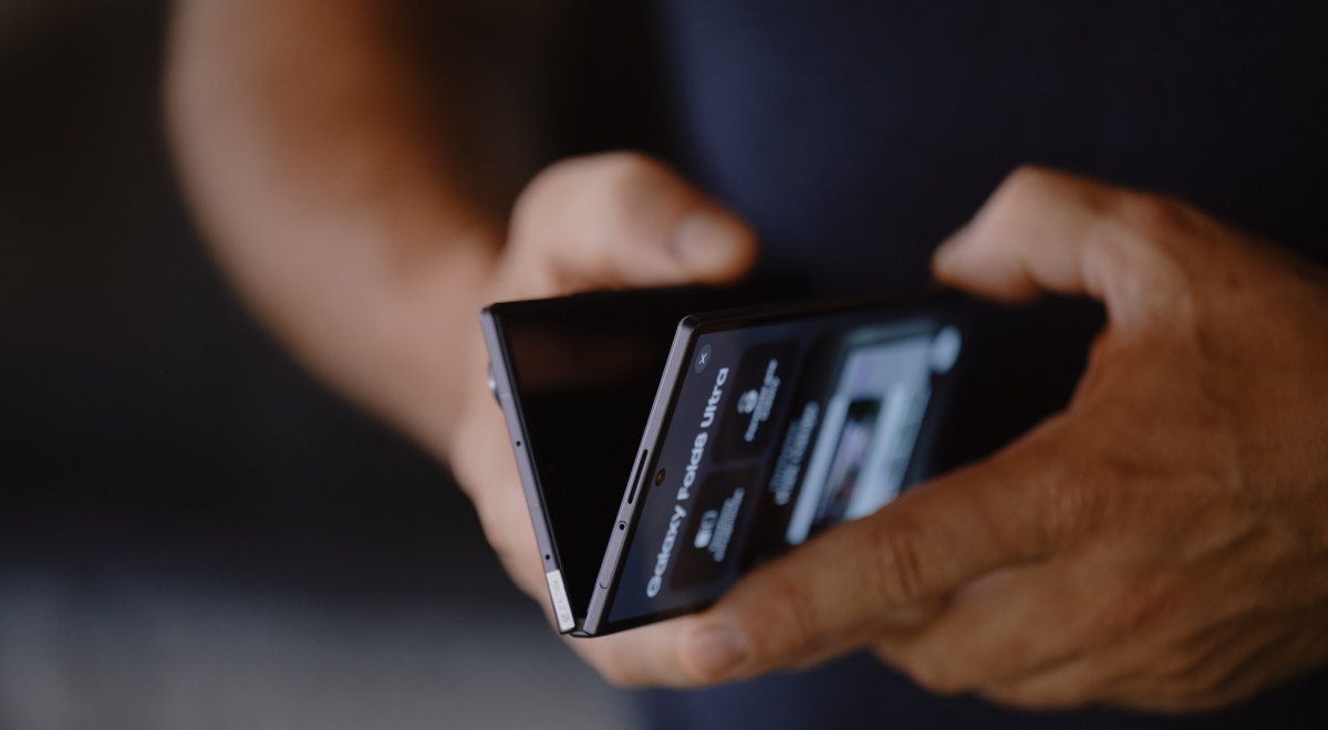 Samsung Unpacked man holding foldable phone