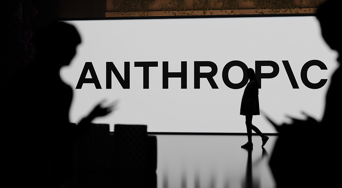 Anthropic logo on the wall screen