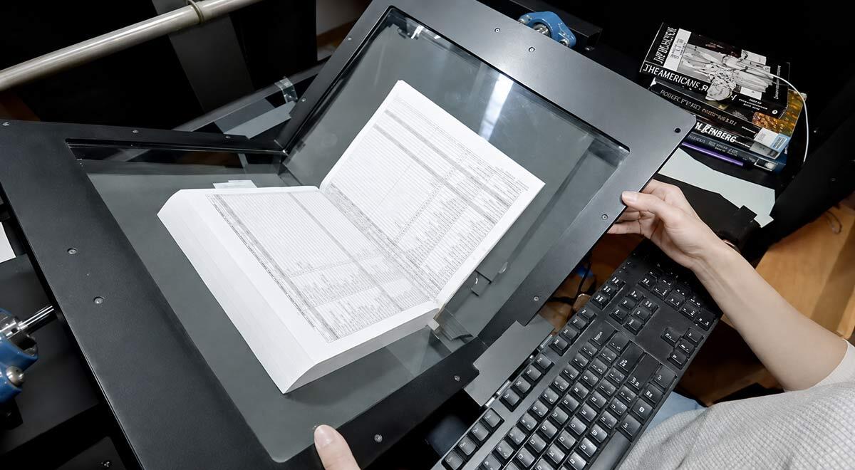 books being scanned page by page