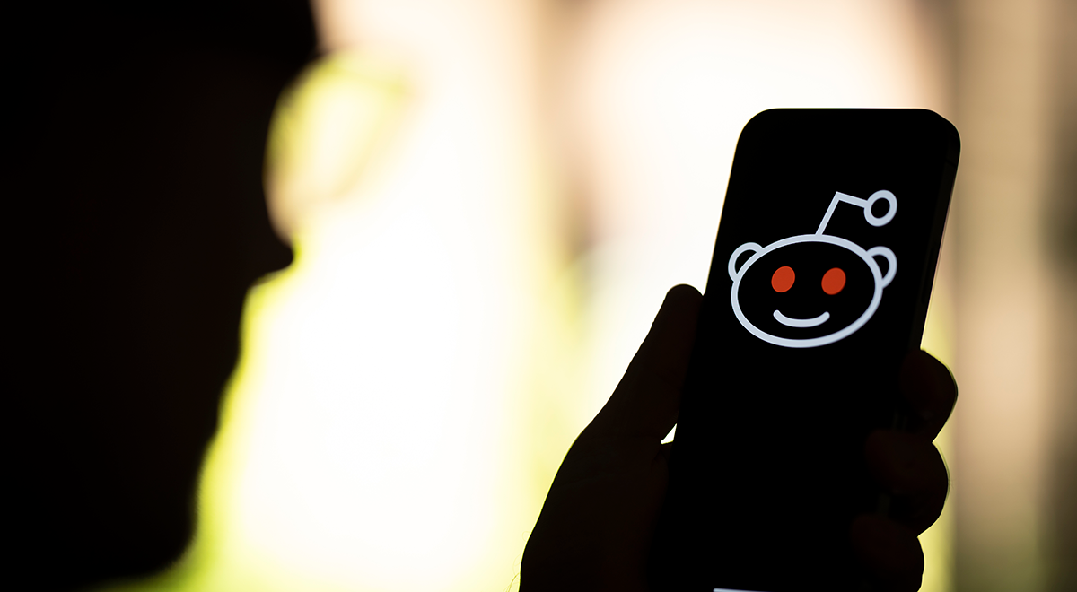 The Reddit logo is seen in this photo illustration