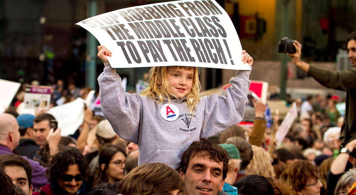A young girl protesting for a better future in Foley Square, 2012.